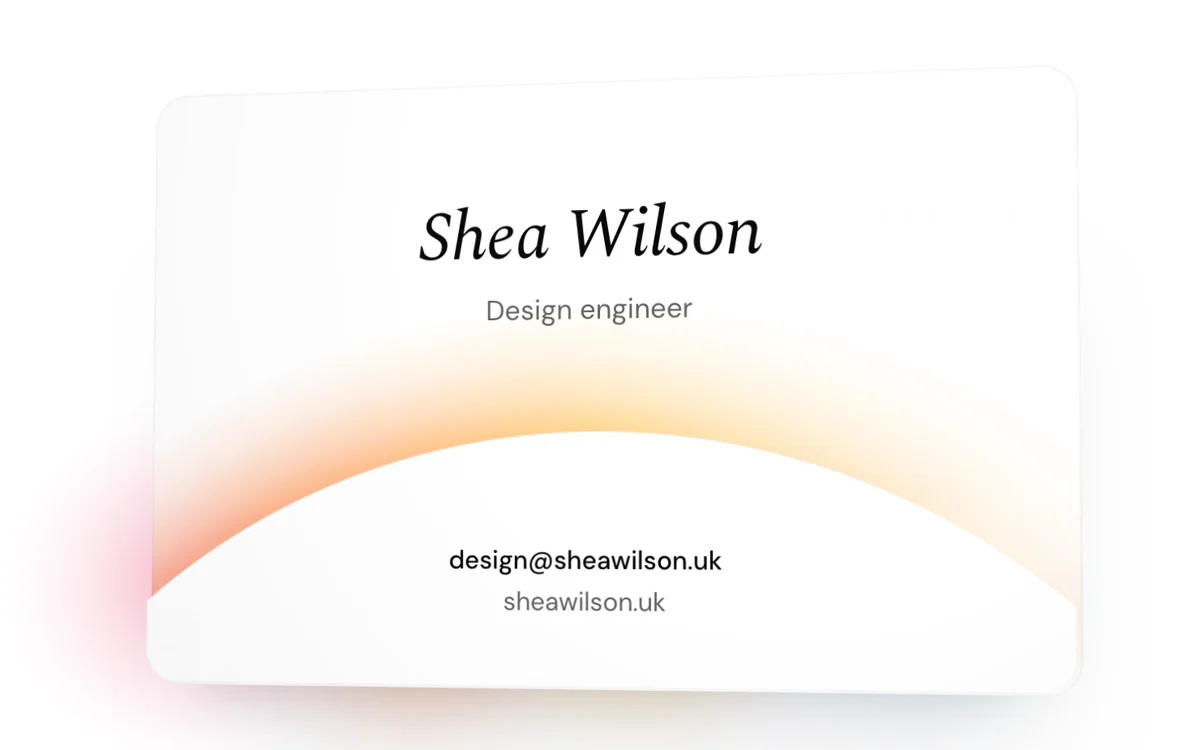 The front of the card tipped towards one corner, with the colour of the ring showing past its edge
