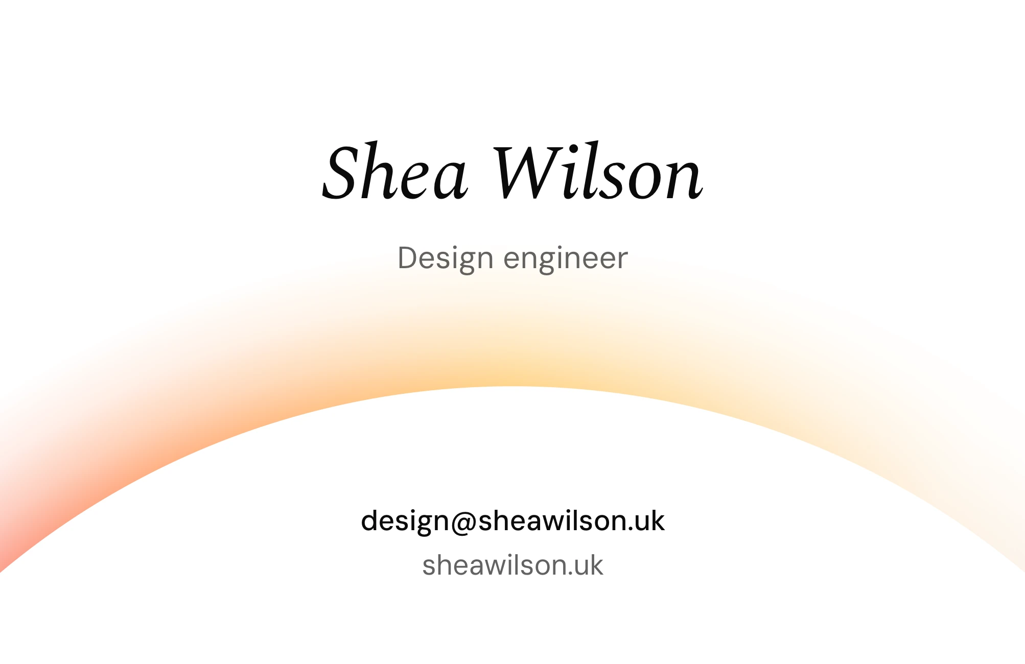 Front of the card: Shea Wilson, design engineer, over a white disc ringed with colour
